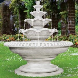 A simple five-tiered stone water fountain placed at the center of the compound